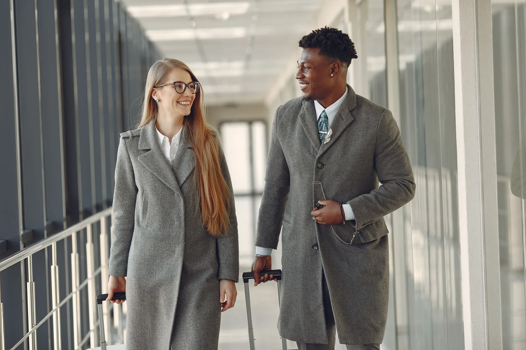 Business professionals travelling through an airport